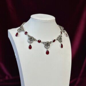 Cranium Couture genuine garnet, stainless steel necklace